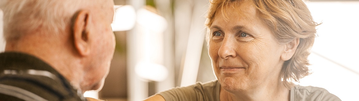 Man and woman looking into eyes